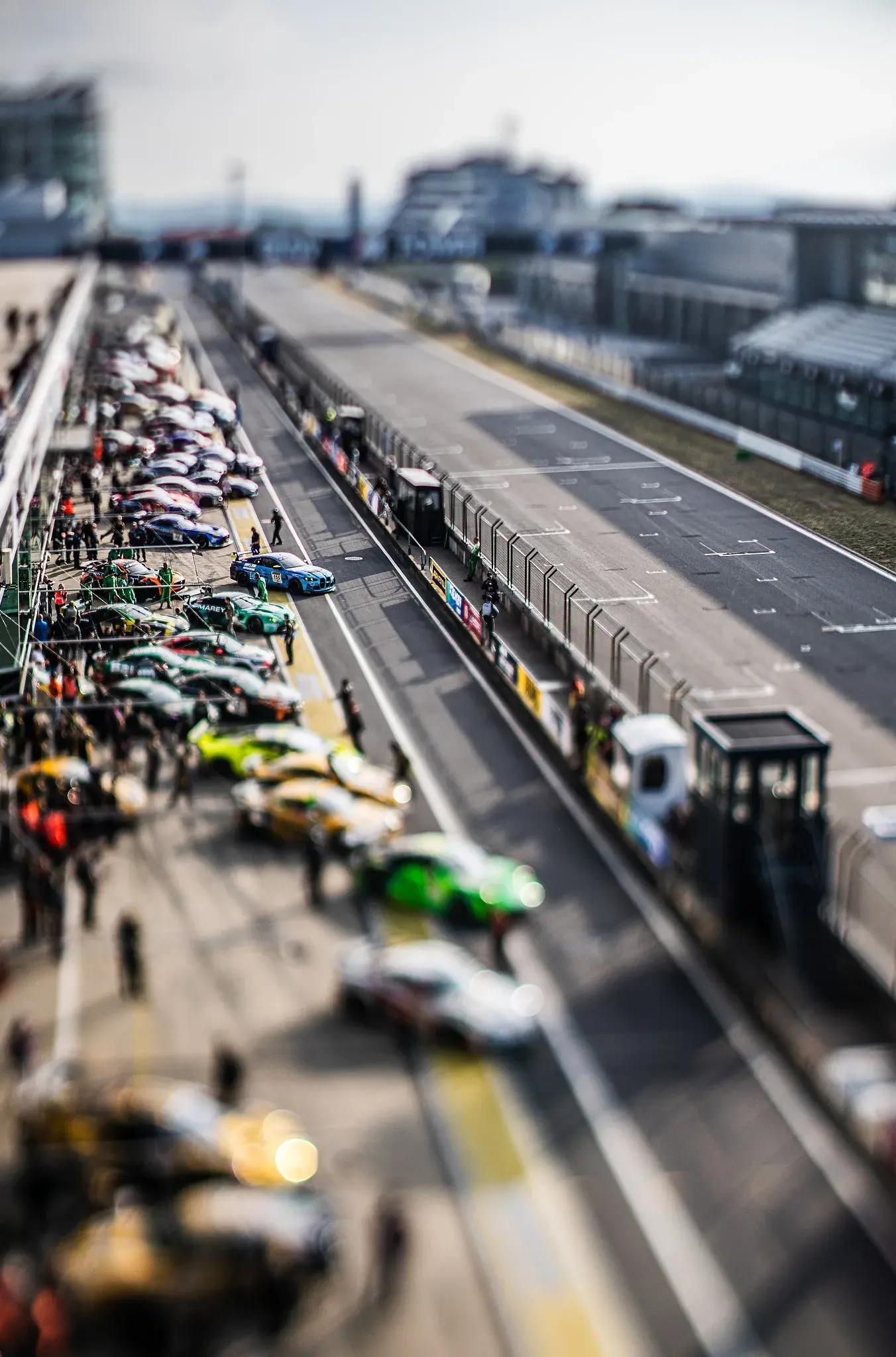 Toy Story - Miniature effect thanks to using tilt lens- paddock at iconic Nürburging.